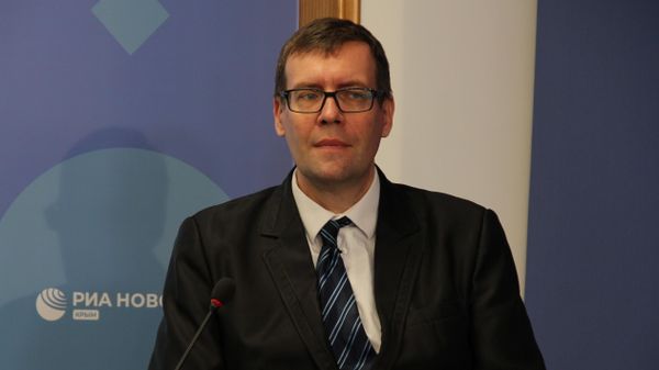 Экономический аналитик Сергей Землячев
