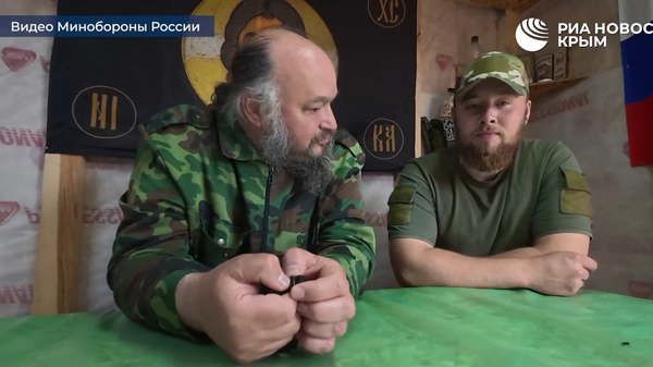 Священники поддерживают дух десантников на передовой