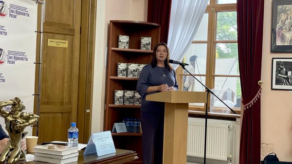  Руководитель регионального подразделения медиагруппы Россия сегодня в Симферополе Елена Черышева на форуме в КФУ