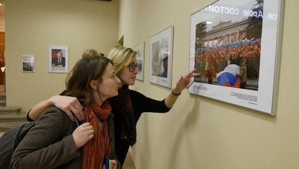 Фотовыставка, посвященная второй годовщине воссоединения Крыма и Севастополя с Россией, в крымском представительстве МИА Россия сегодня