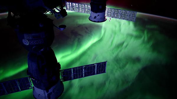 Полярное сияние на Земле снятое с Международной космической станции