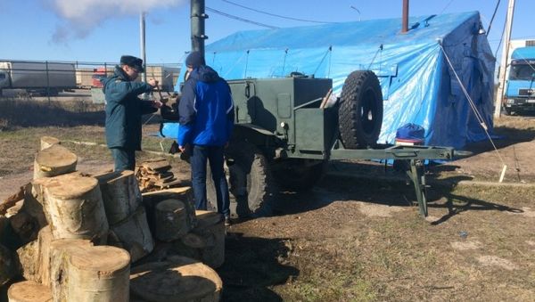На Керченской переправе развернули пункты обогрева и полевую кухню МЧС На Керченской переправе развернули пункты обогрева и полевую кухню МЧС