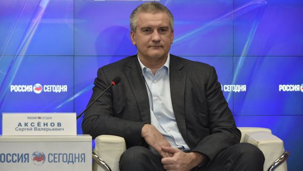 Глава Республики Крым Сергей Аксенов в мультимедийном пресс-центре МИА Россия сегодня в Симферополе Глава Республики Крым Сергей Аксенов в мультимедийном пресс-центре МИА Россия сегодня в Симферополе