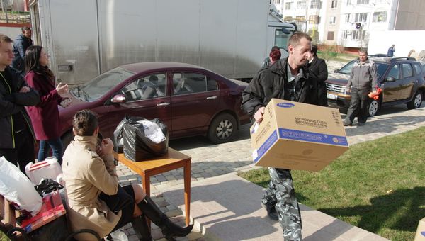 Переселенцы из зоны строительства моста через Керченский пролив переезжают в новые дома