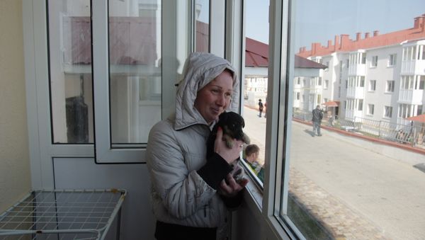 Переселенцы из зоны строительства моста через Керченский пролив переезжают в новые дома