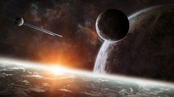 Восход солнца над группой планет