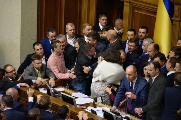 Депутаты на заседании Верховной рады Украины в Киеве. Депутаты на заседании Верховной рады Украины в Киеве.