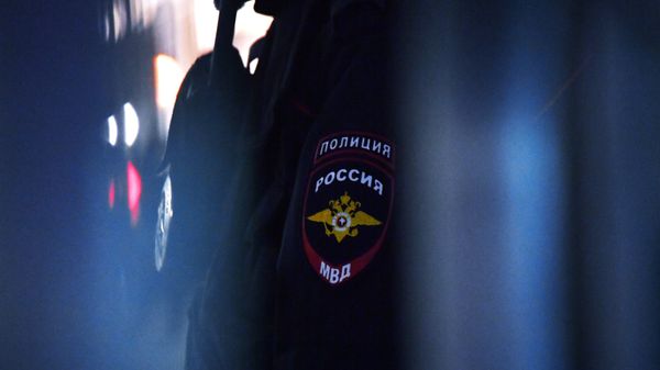 Эмблема на форме сотрудника полиции Эмблема на форме сотрудника полиции