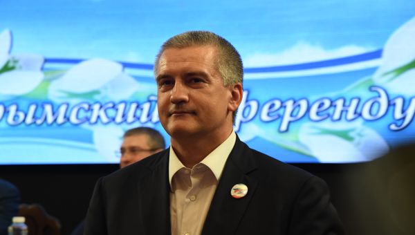 Глава Республики Крым Сергей Аксенов на торжественном собрании по случаю четвертой годовщины воссоединения полуострова с Россией Глава Республики Крым Сергей Аксенов на торжественном собрании по случаю четвертой годовщины воссоединения полуострова с Россией