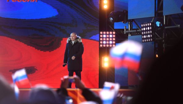 Президент РФ В. Путин посетил митинг-концерт в Москве, посвященный годовщине воссоединения Крыма с Россией