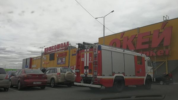 Пожарные машины у ТЦ Комсомол в Иркутске Пожарные машины у ТЦ Комсомол в Иркутске