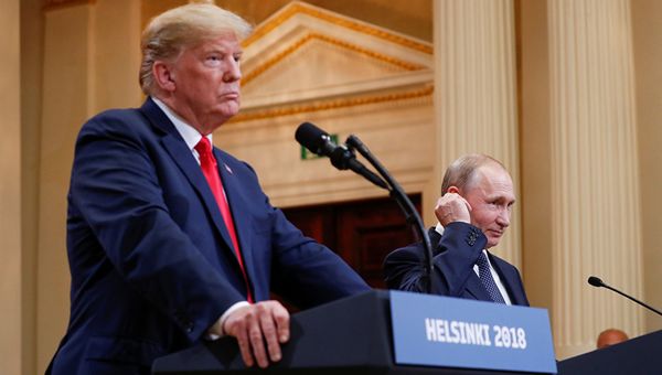 Президент РФ Владимир Путин и президент США Дональд Трамп во время пресс-конференции в Хельсинки. 16 июля 2018