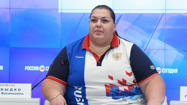 Чемпионка мира по сумо, заслуженный мастер спорта Ольга ДАВЫДКО в мультимедийном пресс-центре МИА Россия сегодня в Симферополе Чемпионка мира по сумо, заслуженный мастер спорта Ольга ДАВЫДКО в мультимедийном пресс-центре МИА Россия сегодня в Симферополе