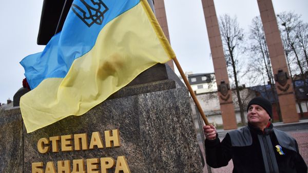 Участник марша националистов, приуроченного к 109-й годовщине со дня рождения Степана Бандеры, во Львове