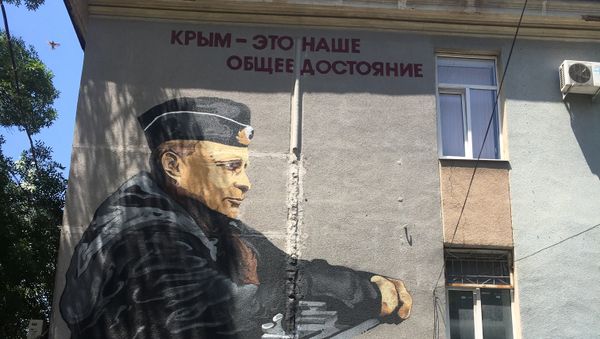 Граффити с изображением президента России Владимира Путина в Симферополе Граффити с изображением президента России Владимира Путина в Симферополе